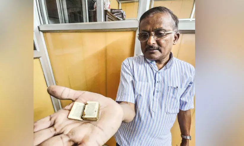 കൗതുകമായി കുഞ്ഞൻ ഖുർആൻ