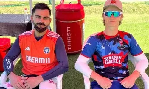 പ​രി​ശീ​ല​ന​ത്തി​നെ​ത്തി​യ ഇ​ന്ത്യ​ൻ ബാ​റ്റ​ർ വി​രാ​ട് കോ​ഹ്‌​ലി നെ​റ്റ്സി​ലെ ബൗ​ള​ർ​ക്കൊ​പ്പം