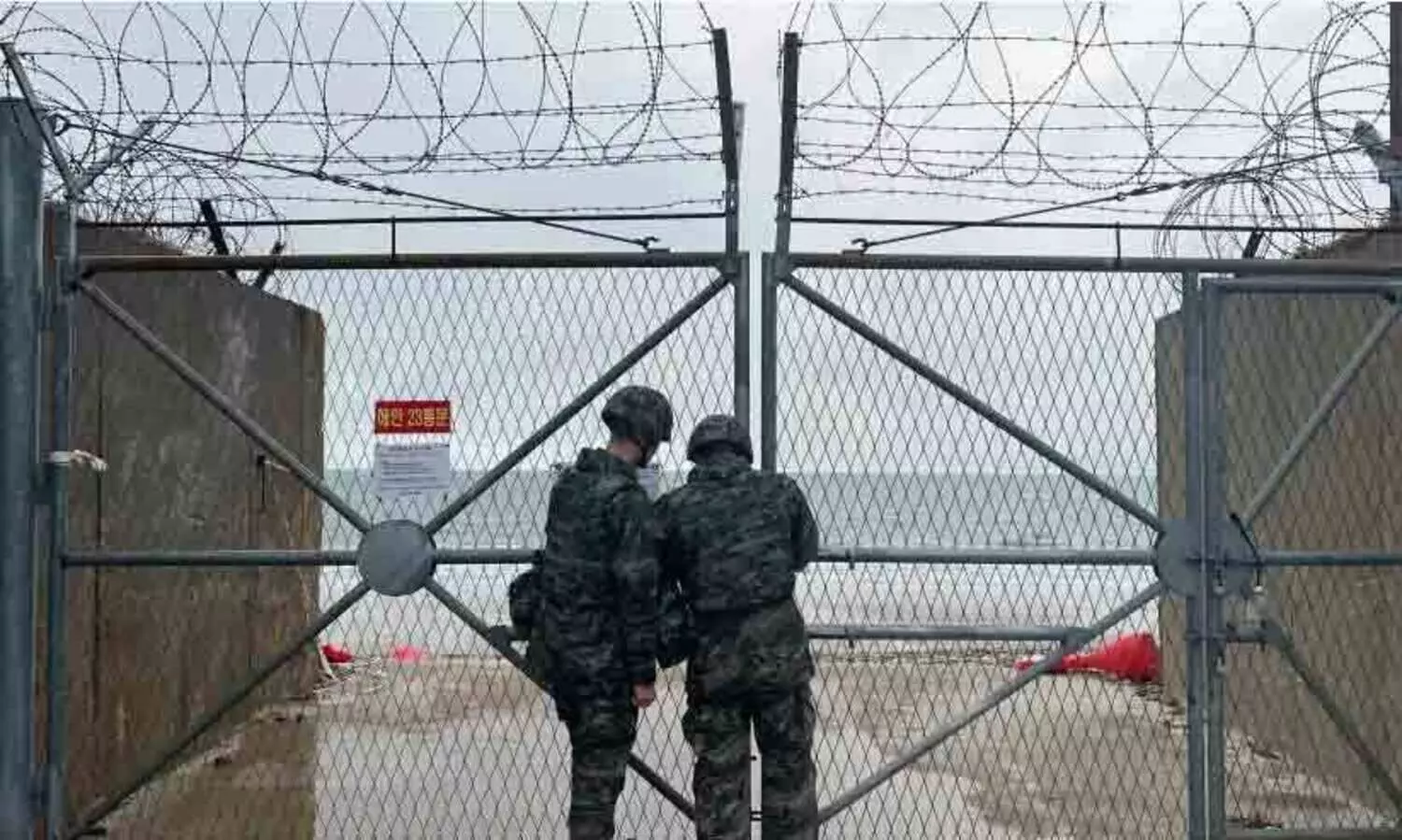 South Korean marines close a gate on Yeonpyeong Island, South Korea, Saturday, Jan. 6, 2024.