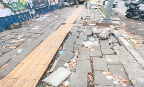 ദേ​ശീ​യ​പാ​ത​യോ​ര​ത്തെ ന​ട​പ്പാ​ത  ത​ക​ർ​ന്നു; ക​ാൽ​ന​ട അ​സാ​ധ്യം