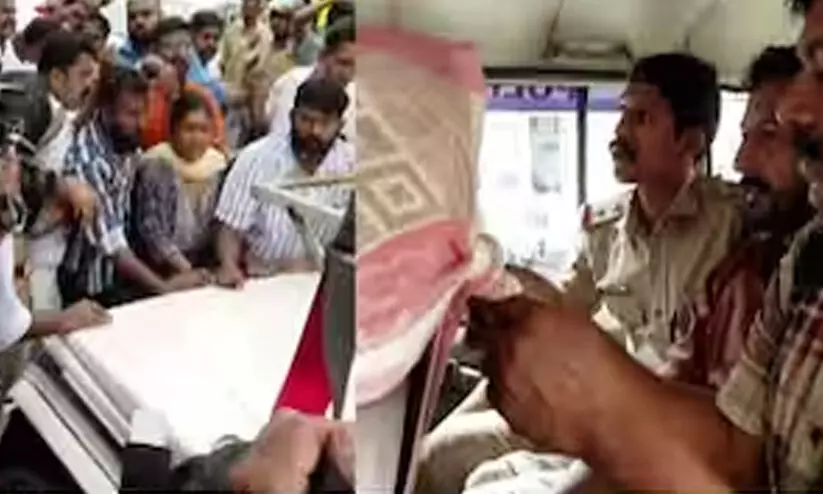 പൊലീസ് വാഹനം കോൺഗ്രസ് പ്രവർത്തകർ തടഞ്ഞു; പ്രതിഷേധങ്ങൾക്കിടെ രാഹുലിനെ വഞ്ചിയൂർ കോടതിയിലെത്തിച്ചു പൊലീസ് വാഹനം കോൺഗ്രസ് പ്രവർത്തകർ തടഞ്ഞു; പ്രതിഷേധങ്ങൾക്കിടെ രാഹുലിനെ വഞ്ചിയൂർ കോടതിയിലെത്തിച്ചു