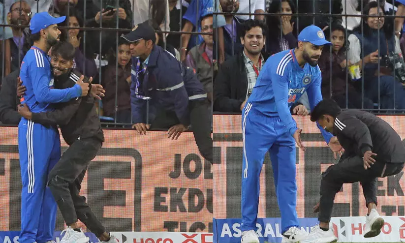 സുരക്ഷ ലംഘിച്ച് ഗ്രൗണ്ടിലെത്തി കോഹ്ലിയെ കെട്ടിപ്പിടിച്ച് ആരാധകൻ; കസ്റ്റഡിയിലെടുത്ത് പൊലീസ് സുരക്ഷ ലംഘിച്ച് ഗ്രൗണ്ടിലെത്തി കോഹ്ലിയെ കെട്ടിപ്പിടിച്ച് ആരാധകൻ; കസ്റ്റഡിയിലെടുത്ത് പൊലീസ്