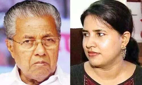 പി​ണ​റാ​യി വി​ജ​യ​ൻ   വീണ വി​ജ​യ​ൻ