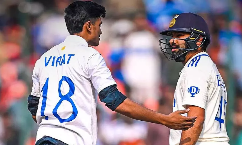 ബാറ്റിങ്ങിനിടെ ഗ്രൗണ്ടിലെത്തി രോഹിത്തിന്‍റെ കാൽതൊട്ട് ആരാധകൻ ‘വിരാട്’; വിഡിയോ വൈറൽ