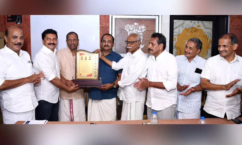 NM Hussain Haji road workers NM Hussain Haji road workers