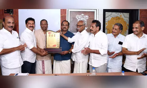 NM Hussain Haji road workers NM Hussain Haji road workers