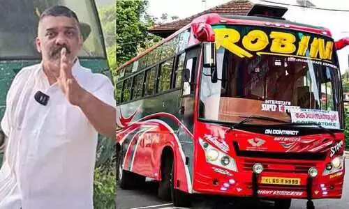 റോബിൻ ബസ് ഉടമ ഗിരീഷ് വധഭീഷണി മുഴക്കിയെന്ന് മോട്ടോർ വാഹന വകുപ്പ് ഉദ്യോഗസ്ഥരുടെ പരാതി