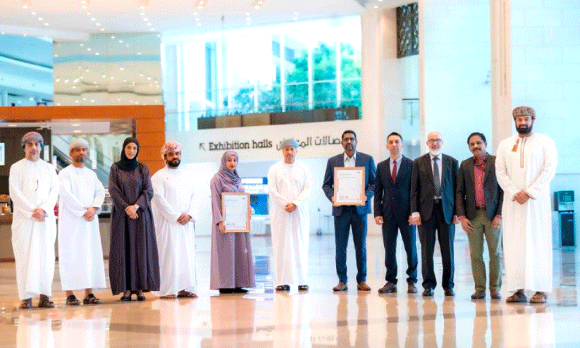 oman convention and exhibition center officials with ISO certificate