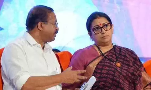 Smriti Irani,V Muralidharan