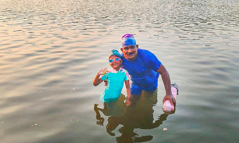 മെഹ്നാസ് അലിഷേക്ക് നീന്തൽ പരിശീലകനോടൊപ്പം മെഹ്നാസ് അലിഷേക്ക് നീന്തൽ പരിശീലകനോടൊപ്പം