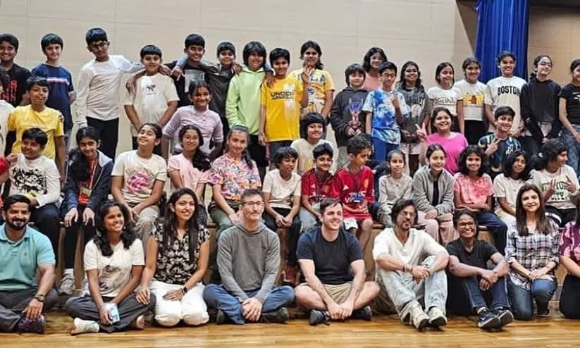 Shah Rukh Khan attends AbRam’s school event, poses with teachers and students