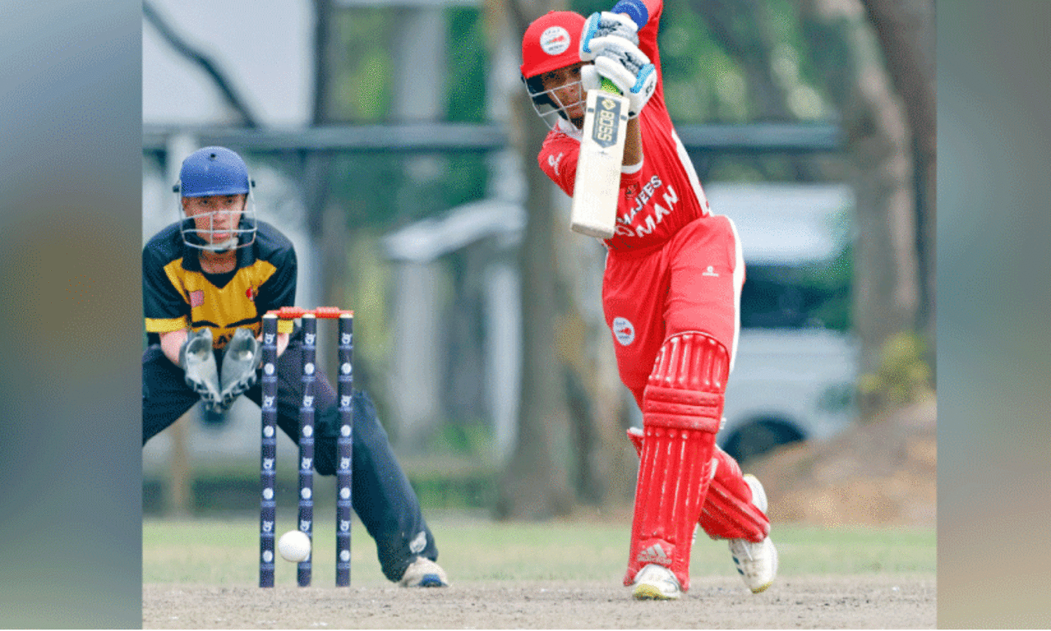 Oman cricketer batting