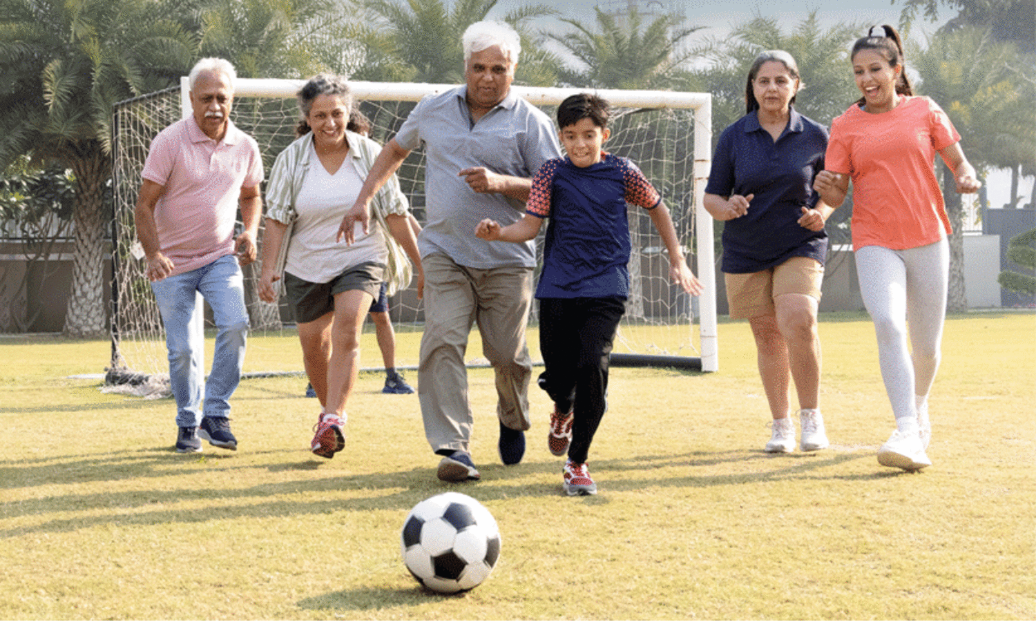 family playing football