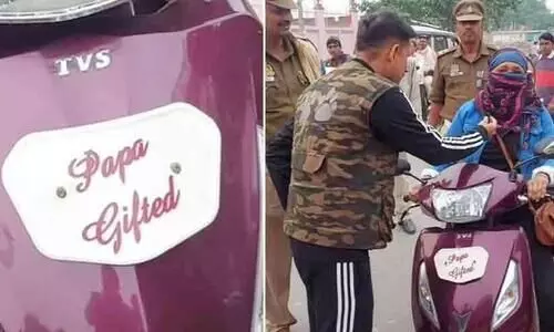 caught for riding without a helmet