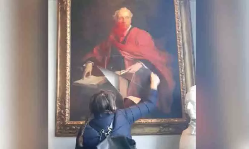 destroy historic painting of Lord Balfour at Cambridge University