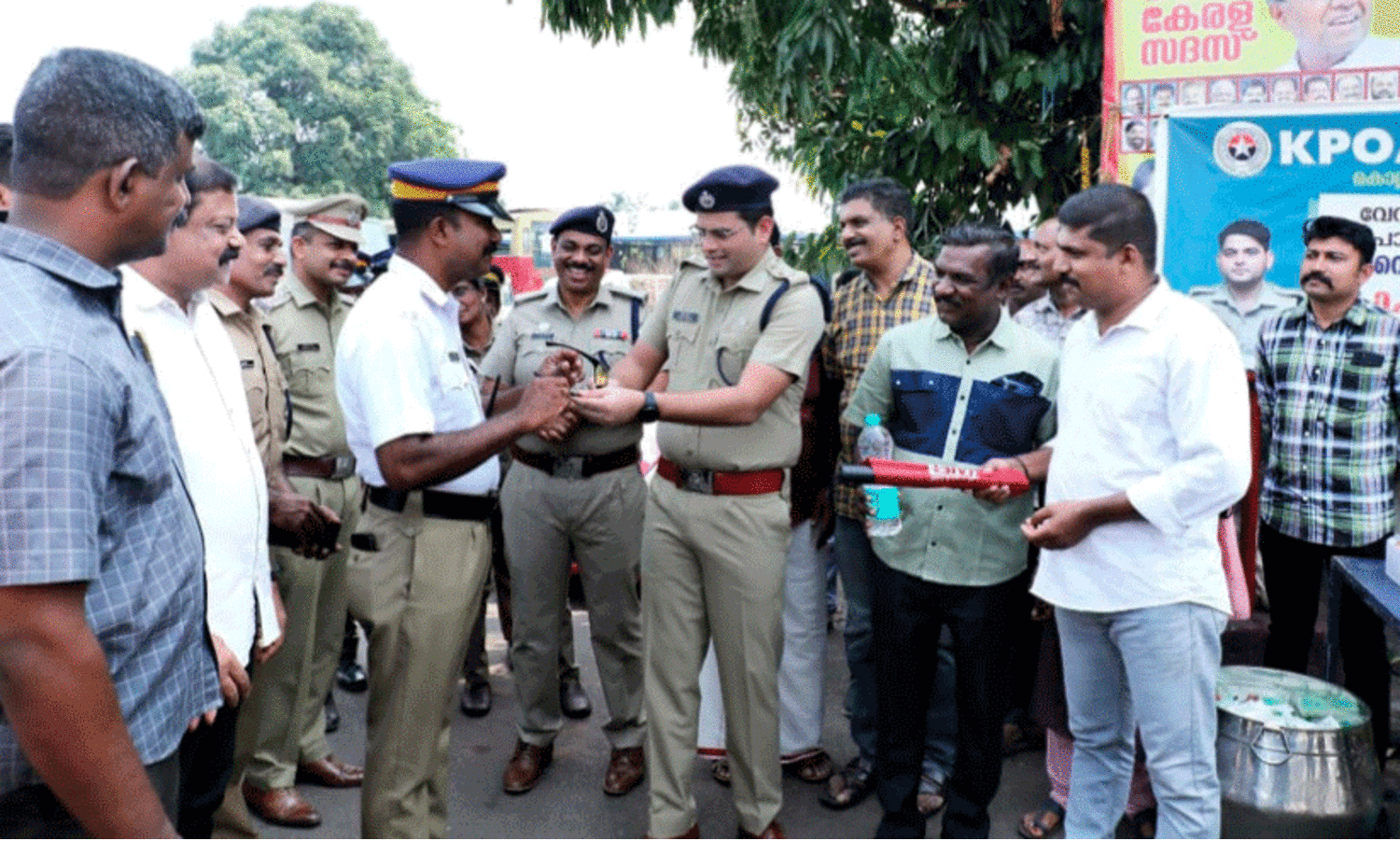 distributing drinking water and sunglasses