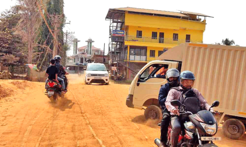 as part of national highway development mandalamkunn-kochannur road dumped with red sand