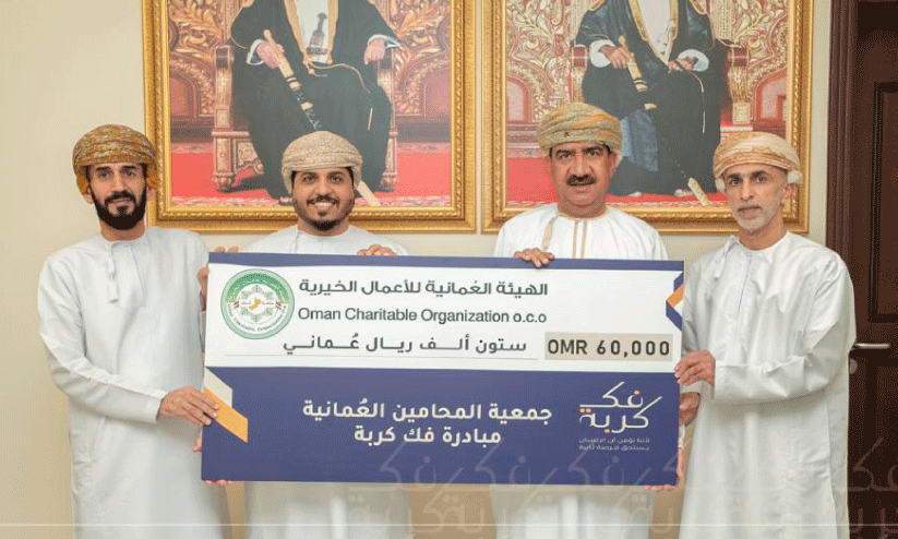 man charitable organization handing over help for fak kuruba project