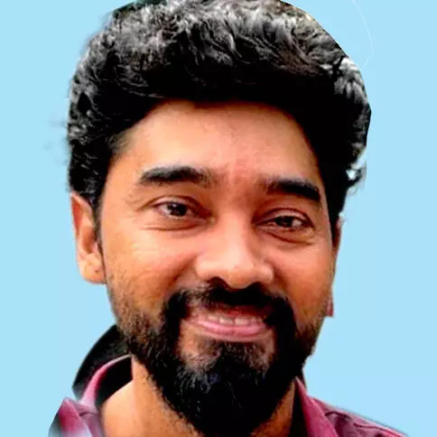 അ​സീ​സ്