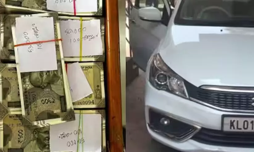 കാറിൽ 500 ന്റെ നോട്ടുകെട്ടുകൾ: പൊലീസ് പിടിച്ചെടുത്തത് 10 ലക്ഷം കാറിൽ 500 ന്റെ നോട്ടുകെട്ടുകൾ: പൊലീസ് പിടിച്ചെടുത്തത് 10 ലക്ഷം