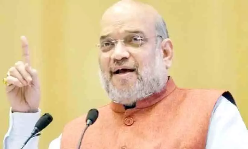 അ​മി​ത് ഷാ