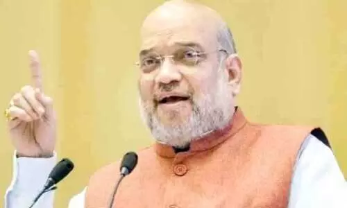 അ​മി​ത് ഷാ