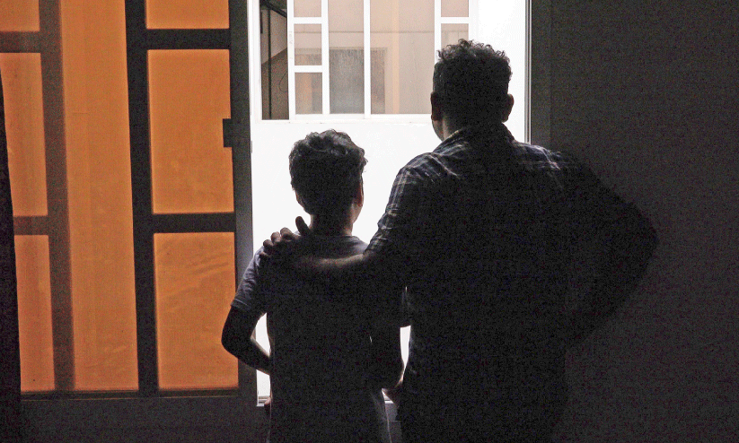 The boy who stuck in oman, with his father The boy who stuck in oman, with his father