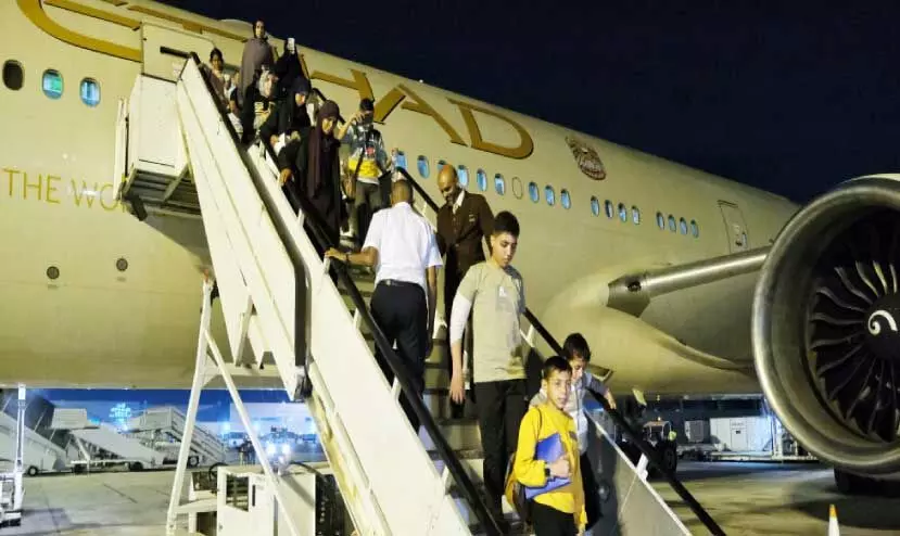 sick and wound people from gaza disembark at abu dhabi airport