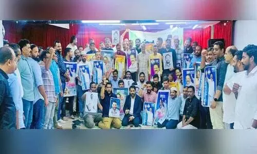 KMCC Kannur members with election posters