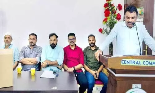 central committee president c.p musthafa inaugurating malappuram KMCC eid gift distribution program