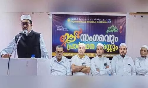 Shihab master sharing eid message on KIC organized eid gathering