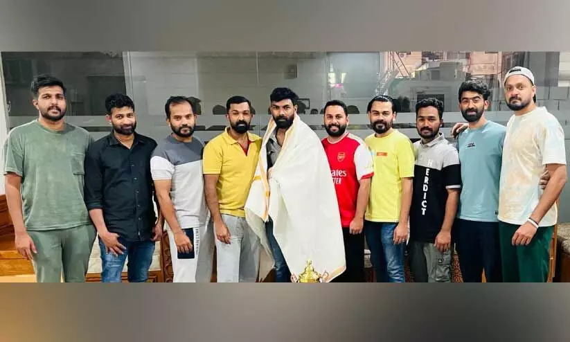 carroms tournament winner mirshad with FCC aryts and sports club team carroms tournament winner mirshad with FCC aryts and sports club team