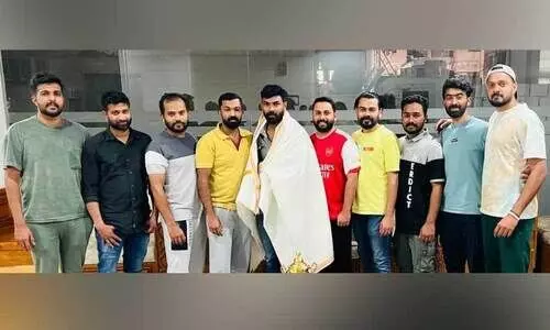 carroms tournament winner mirshad with FCC aryts and sports club team