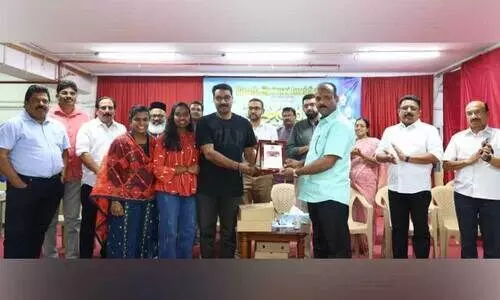 handovering gift to anai kumar