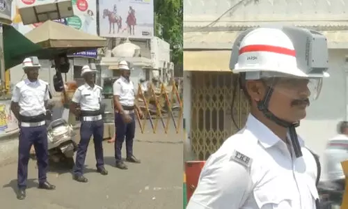 AC helmet to face the heat! Students with a new invention
