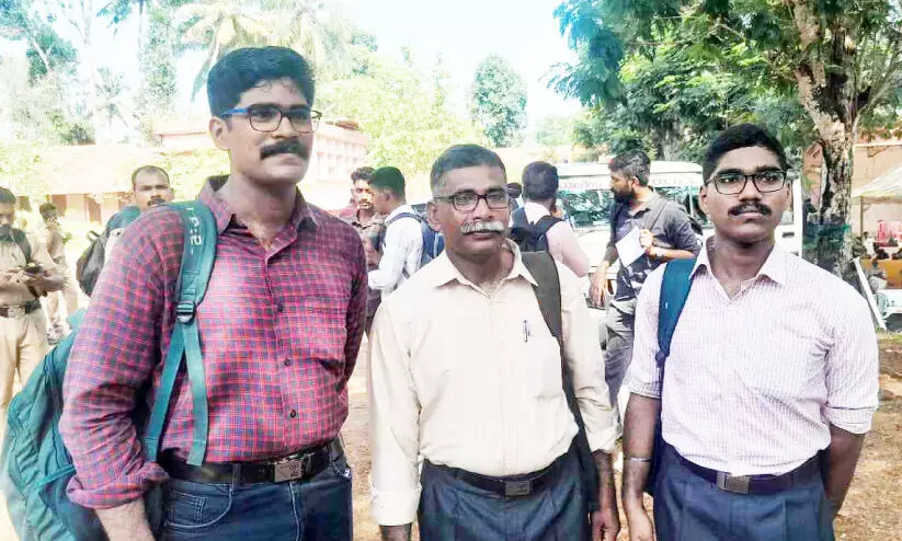 തി​ര​ഞ്ഞെ​ടു​പ്പി​ന് സുരക്ഷ ഒരുക്കാൻ അച്ഛനും മക്കളും