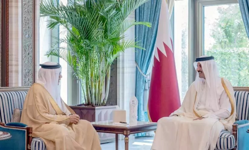 Bahrain foreign minister and Qatar Amir on meeting