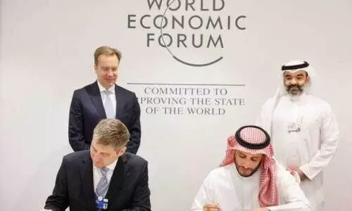 Saudi space agency CEO Dr. Muhammad Al-Thamimi and World Economic Forum Managing Director Jeremy
