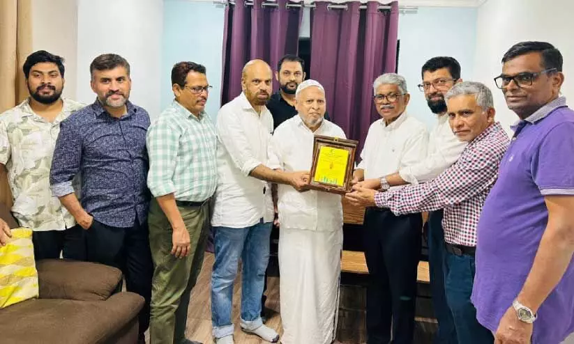 handed over gift to muhammed koya handed over gift to muhammed koya