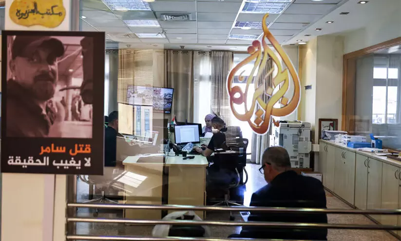 raid Al Jazeeras offices