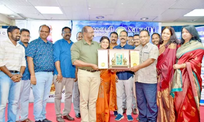 handed over the award