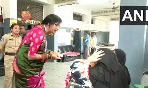 BJP’s Madhavi Latha verifies identities of Hyderabad women in ‘burqa