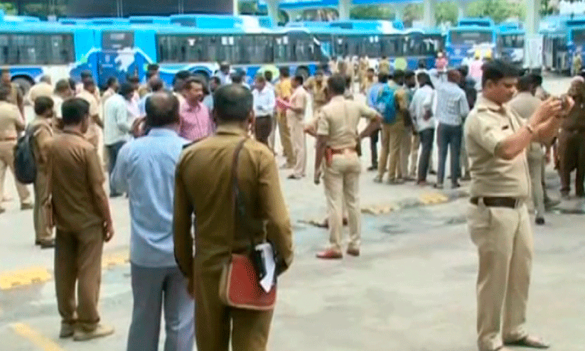 Electric bus workers