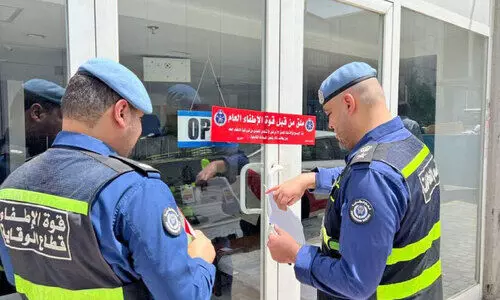 Fireforce employees post notices in the establishment