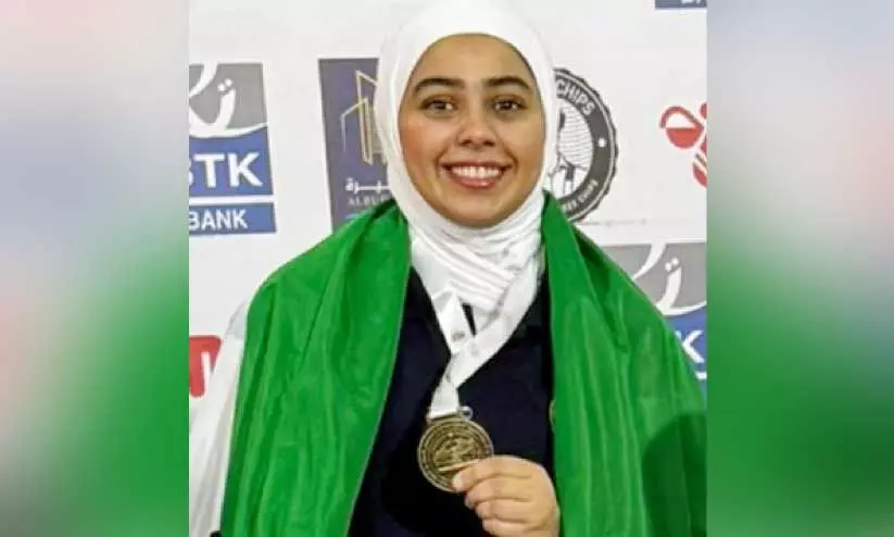 Ghazal Al Hindi with Medal