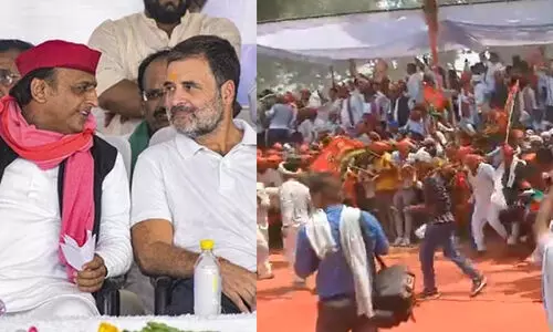 ബാരിക്കേഡുകൾ തകർത്ത് ജനം തള്ളിക്കയറി; പ്രസംഗിക്കാനാവാതെ വേദിവിട്ട് രാഹുലും അഖിലേഷും
