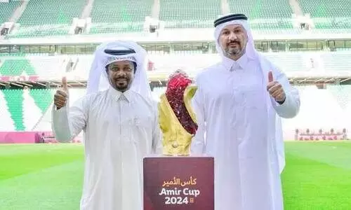 Qatar SC coach and Al Sadd FC coach with Amir cup trophy