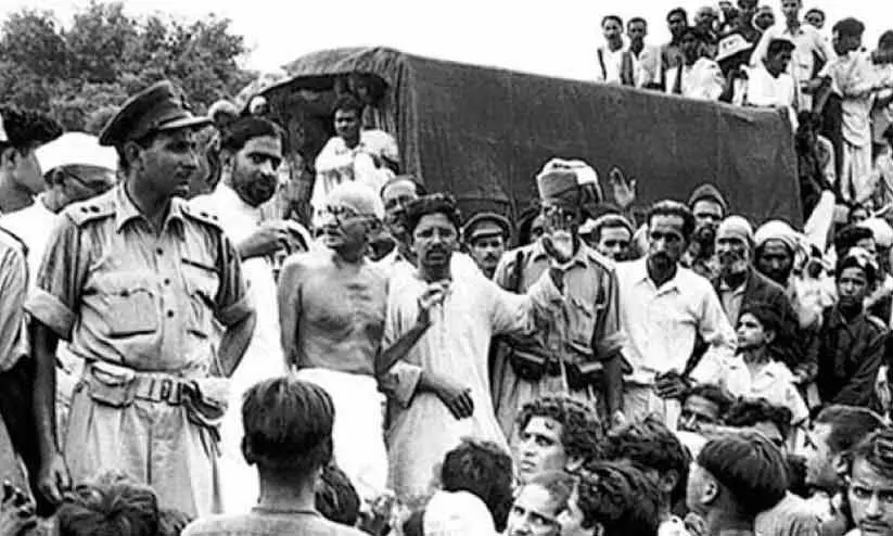 ചമ്പാരൻ സത്യഗ്രഹ സമരവേളയിൽ ഗാന്ധിജി അനുയായികൾക്കൊപ്പം ചമ്പാരൻ സത്യഗ്രഹ സമരവേളയിൽ ഗാന്ധിജി അനുയായികൾക്കൊപ്പം