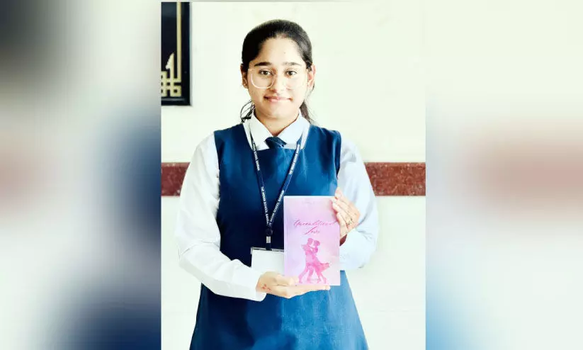 ആദ്യ നോവലിന്റെ ആഹ്ലാദത്തിൽ മെർലിൻ ആദ്യ നോവലിന്റെ ആഹ്ലാദത്തിൽ മെർലിൻ