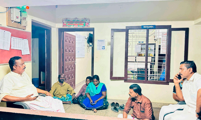 The family protested by sitting in front of the KSEB office The family protested by sitting in front of the KSEB office